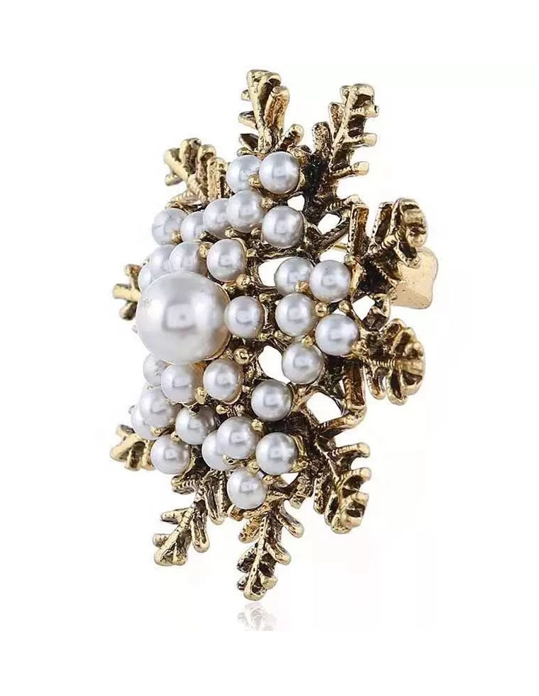 Broche flocon de noel en laiton vieilli