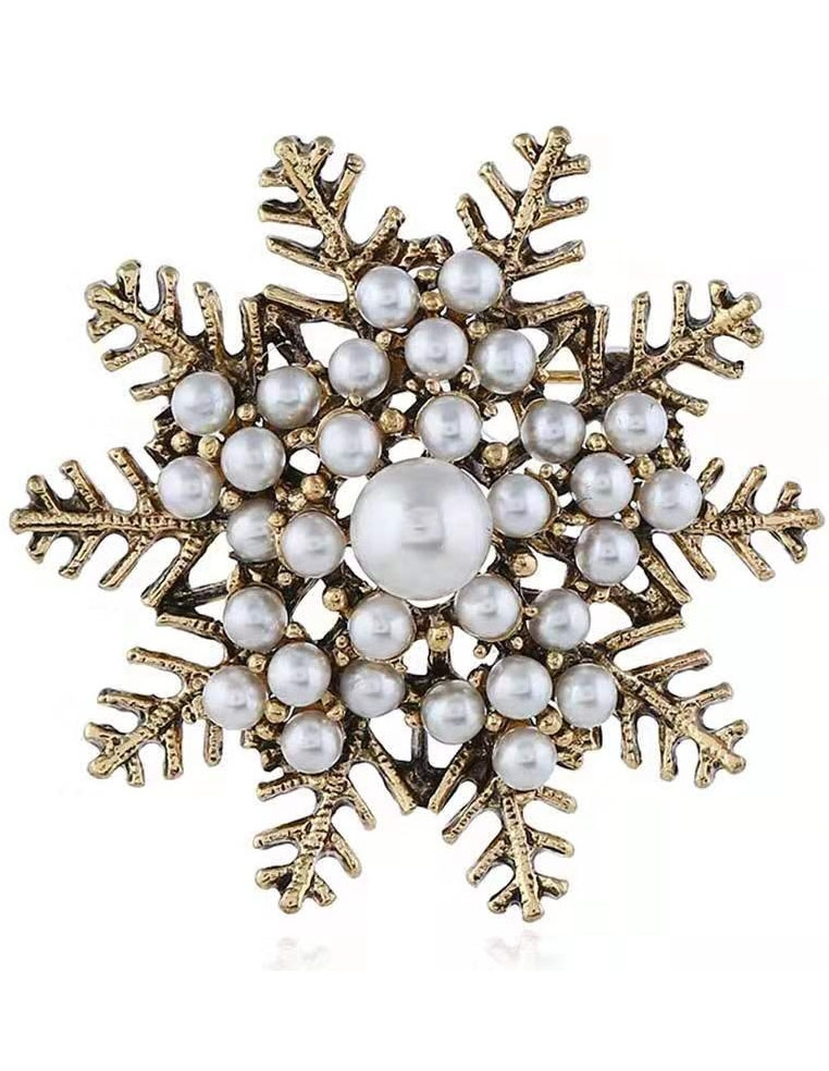 Broche flocon de noel en laiton vieilli