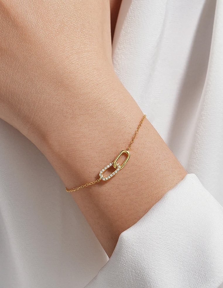 Bracelet plaque or et strass pour femme