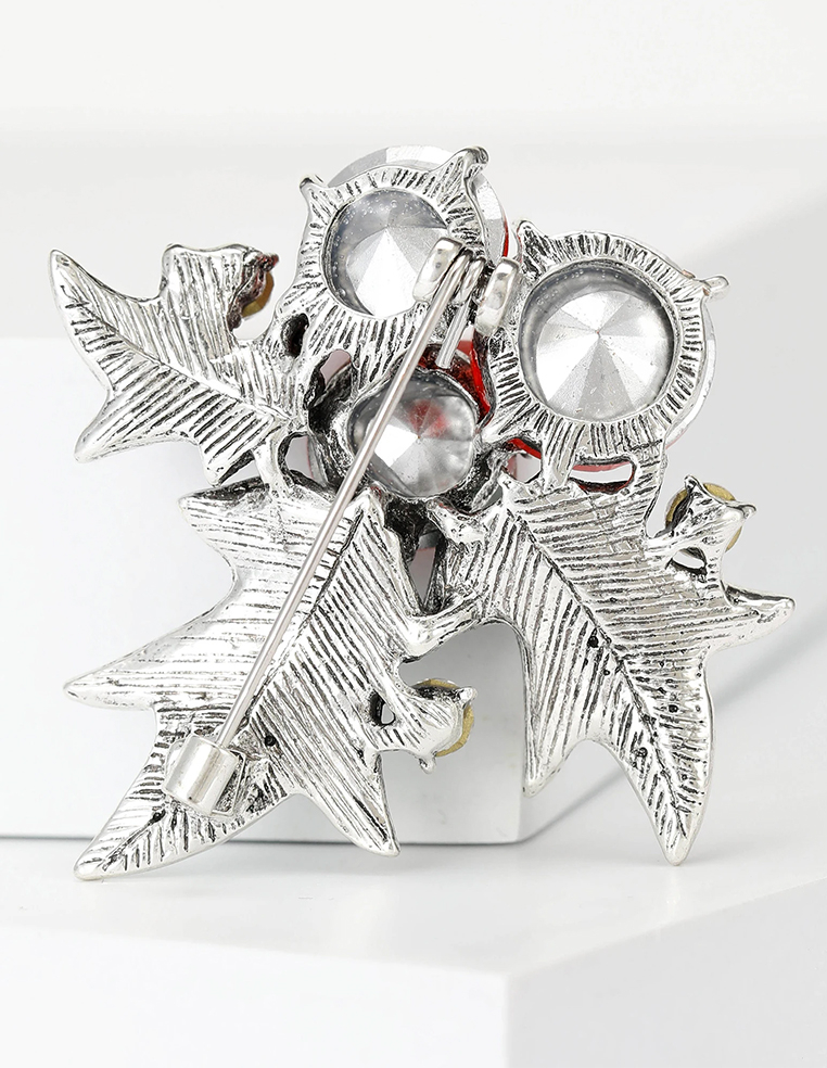 Broche de Noël en forme de houx